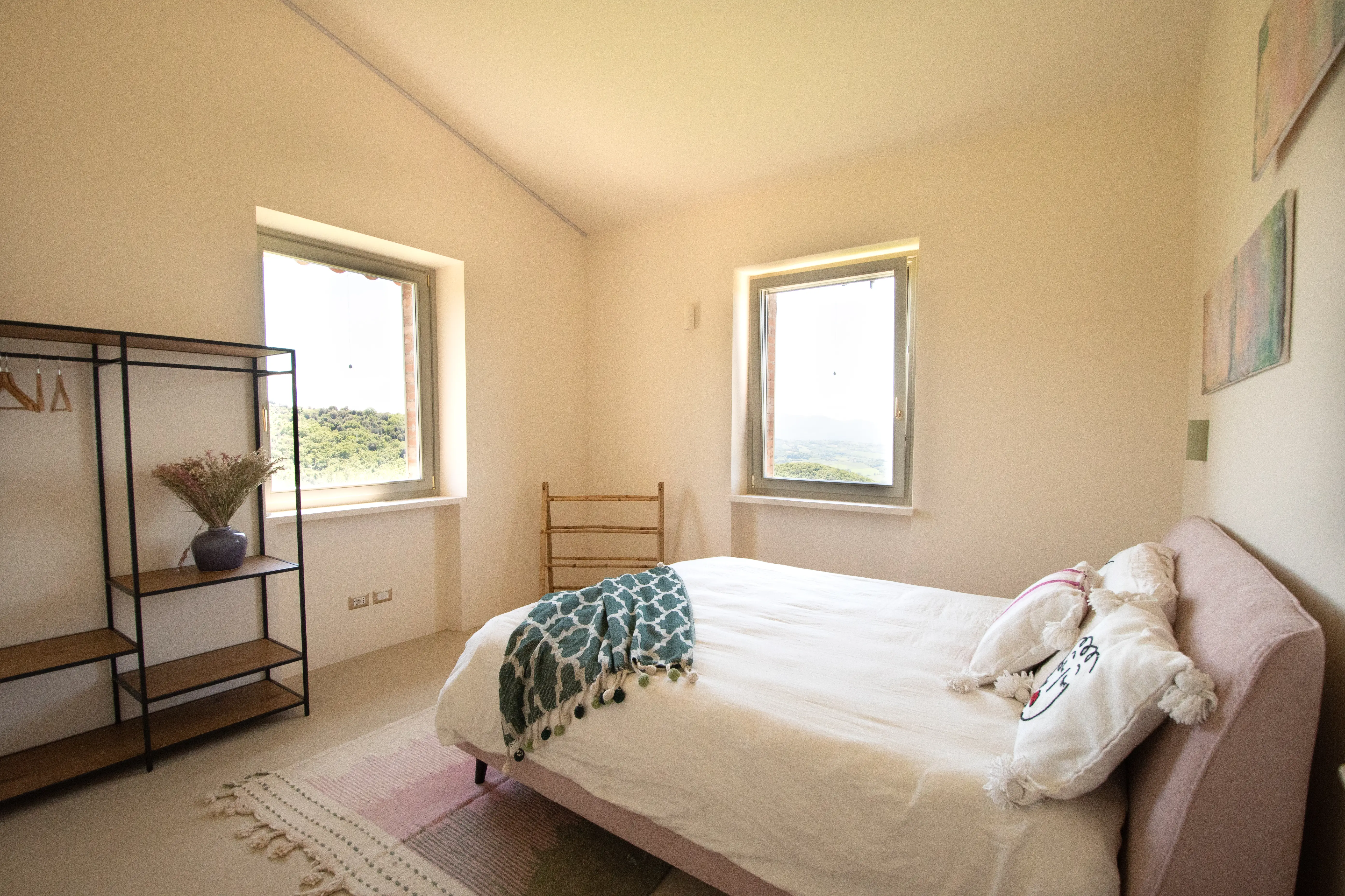 View of the spacious main bedroom at Villa Lidia