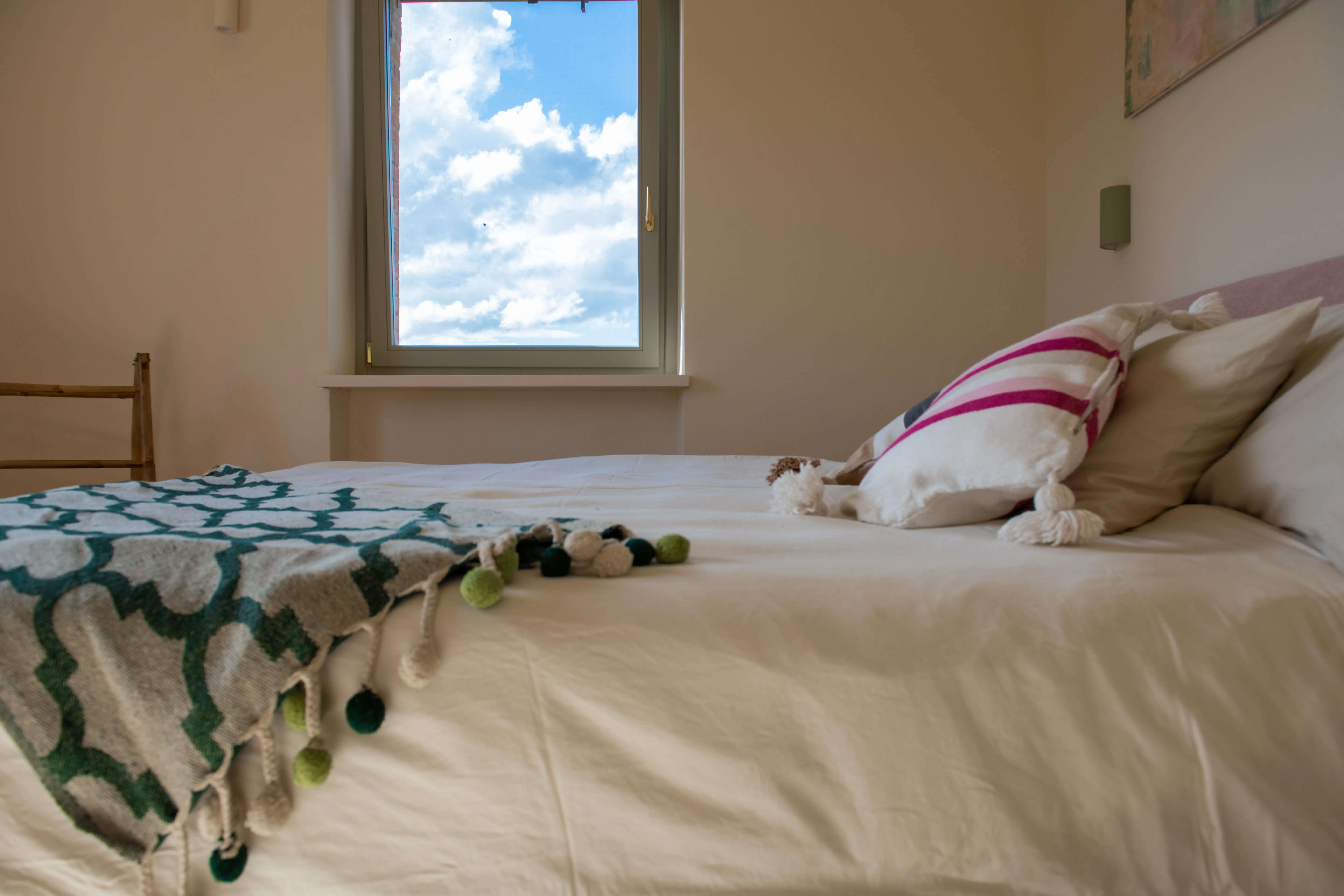 View of the spacious main bedroom at Villa Lidia