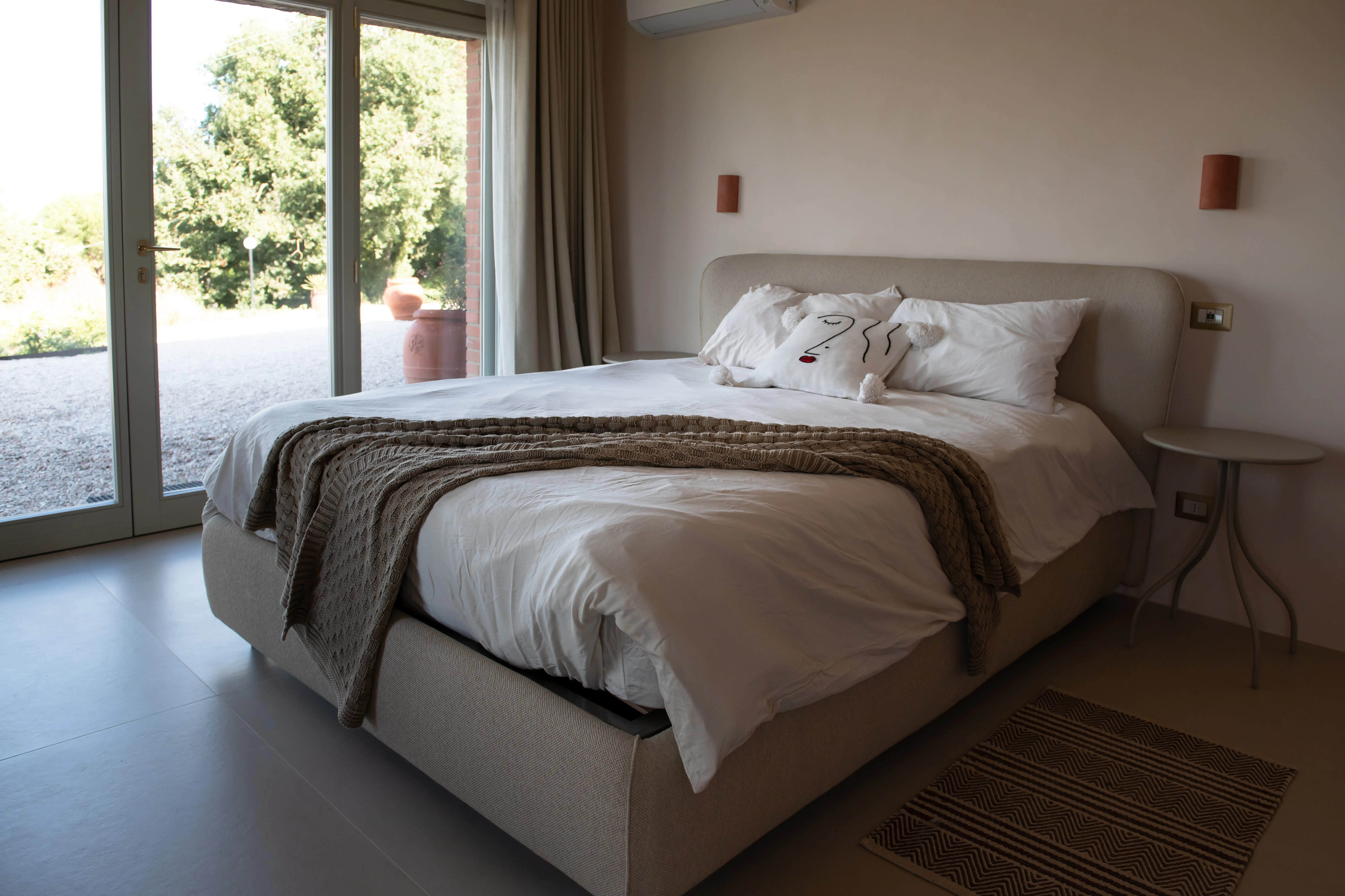 View of the spacious main bedroom at Villa Lidia