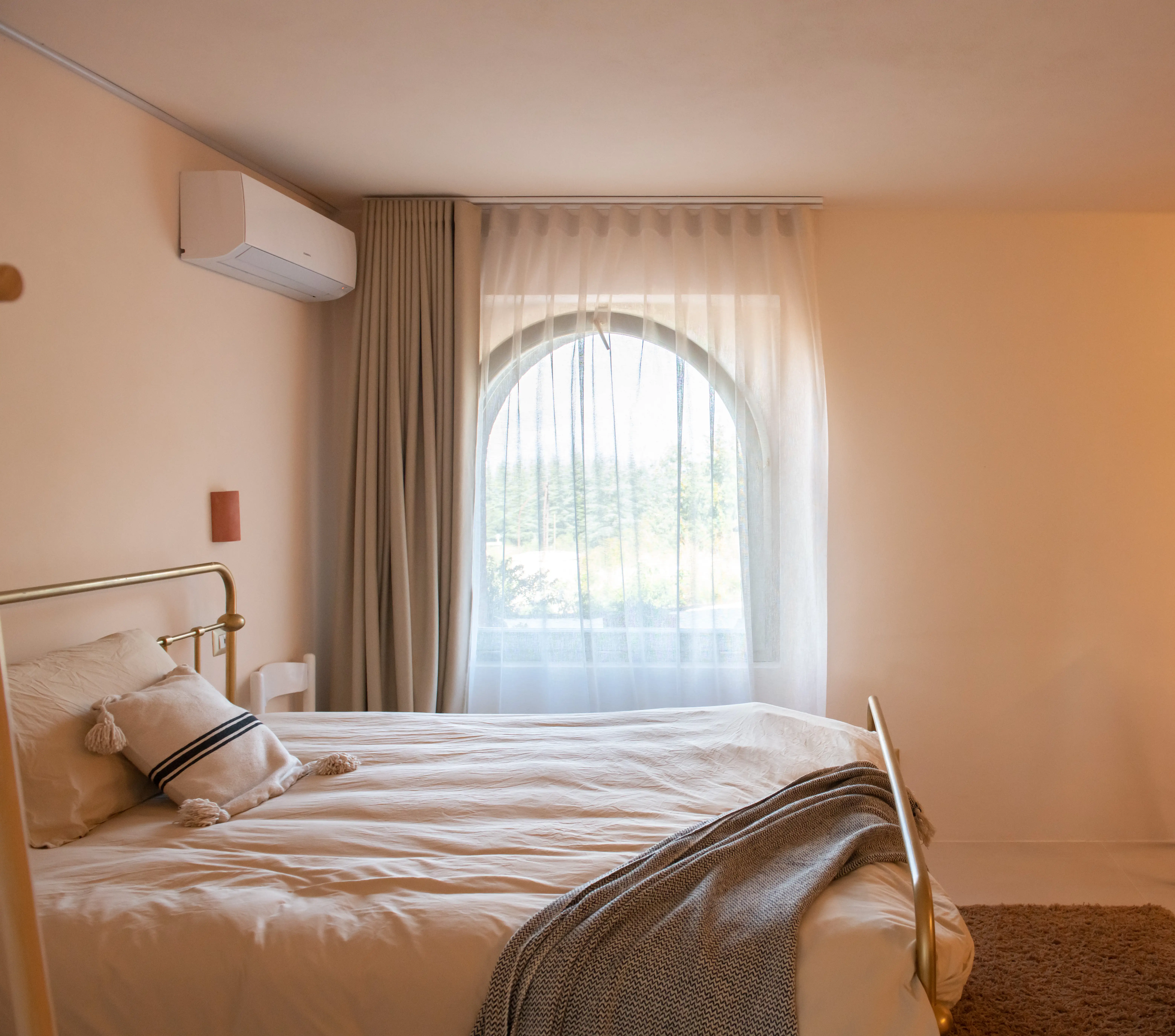 View of the spacious main bedroom at Villa Lidia